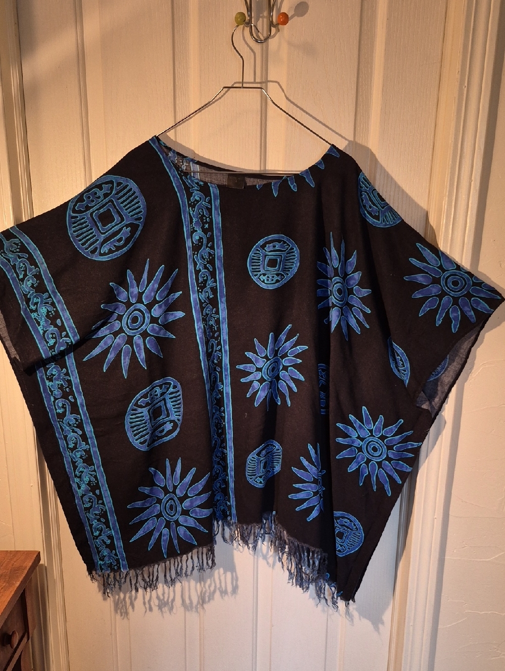 Koko Knot Black Poncho with Blue Sunburst & Coin Motif